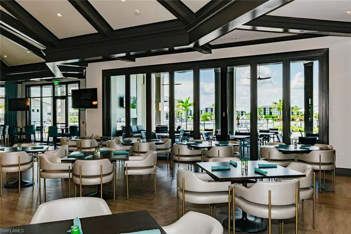 Building lobby featuring beamed ceiling