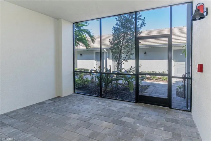 Empty room featuring floor to ceiling windows