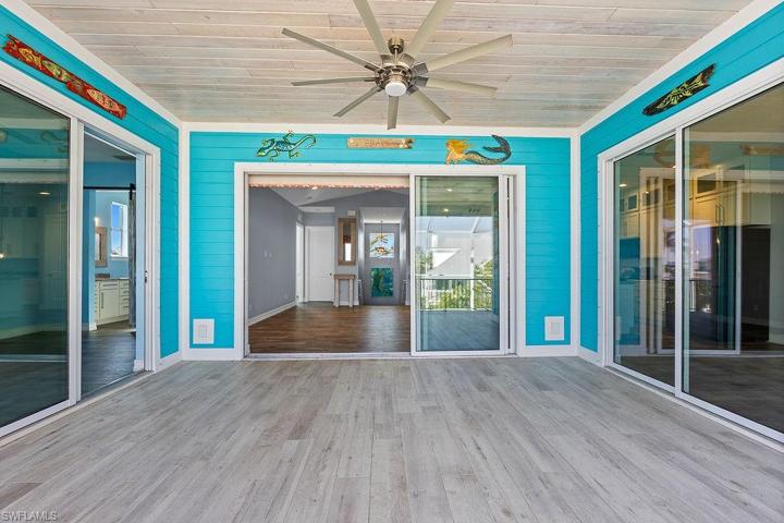 Balcony Lanai outside of living room, Master Bed to the left and Breakfast nook to the right
