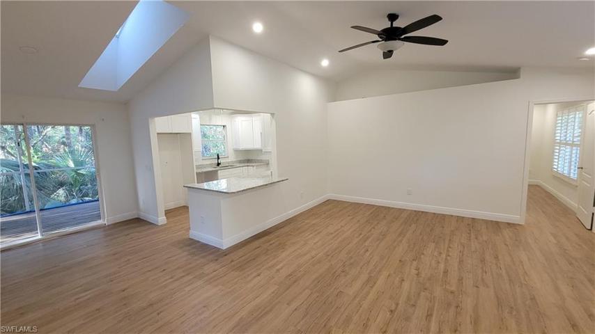View at kitchen/living/dining from entrance