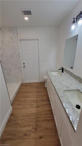 Master bathroom with door to outside deck