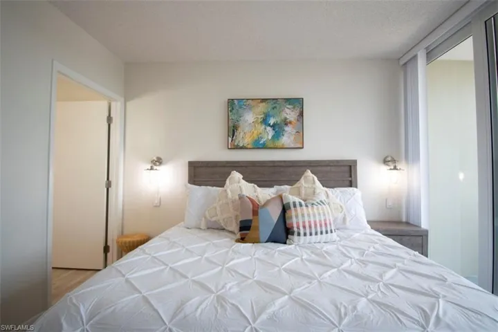 Bedroom with a closet and a textured ceiling