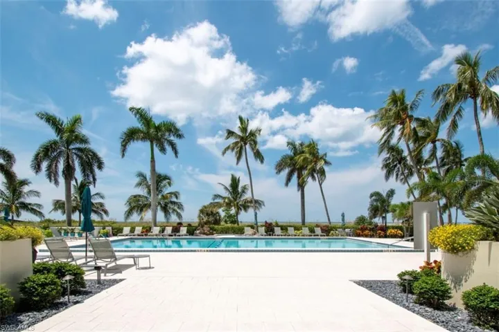 Community pool with a patio area