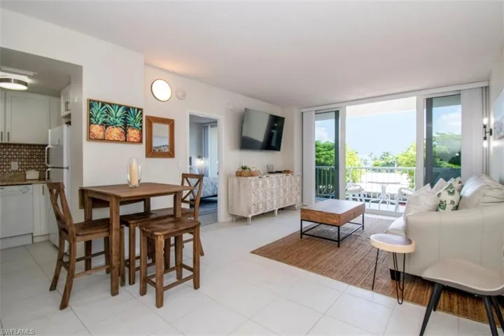 Dining space featuring floor to ceiling windows