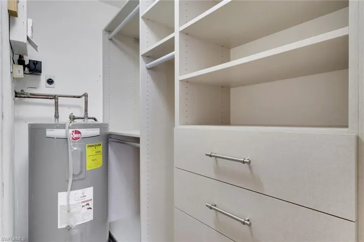 Utility room with electric water heater