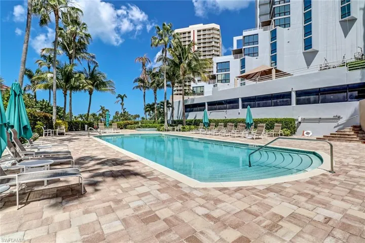 Community pool featuring a patio area