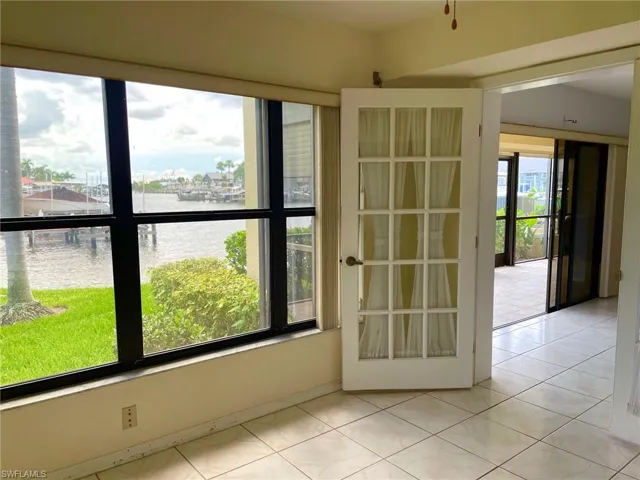 Den has French doors & plenty of windows which make a end unit even better!