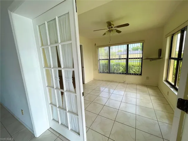 Spacious with extra side windows & 2 closets.