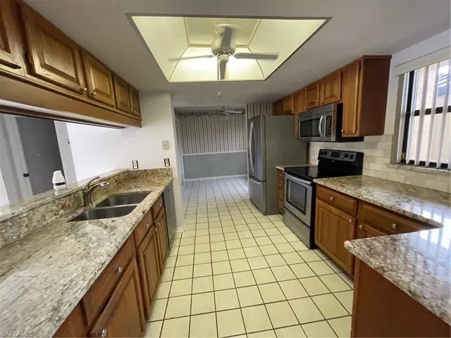 Updated kitchen with tile & SS appliances.
