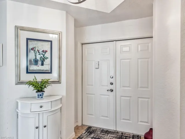 Foyer with a textured wall
