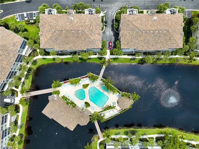 Aerial view featuring a water view