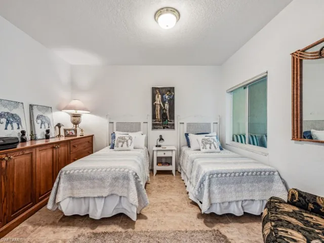 Bedroom featuring a textured ceiling