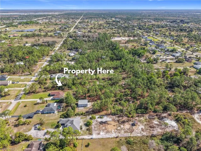 View of property location featuring nearby suburban area