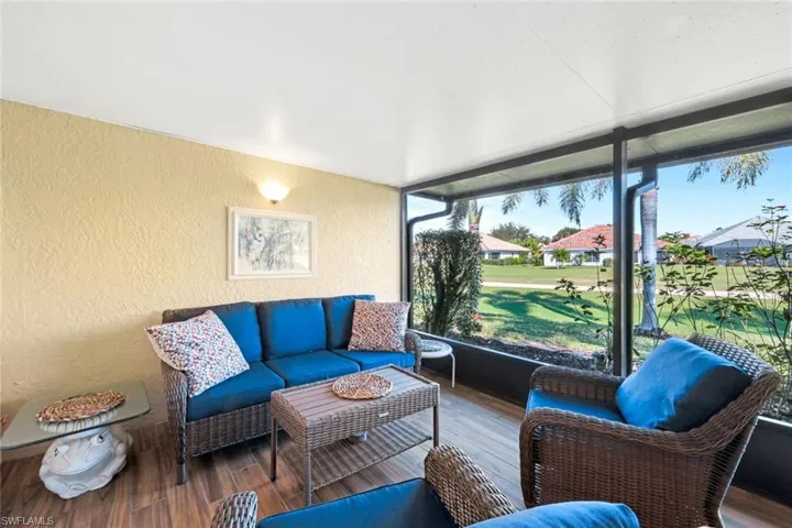 Sunroom featuring a healthy amount of sunlight