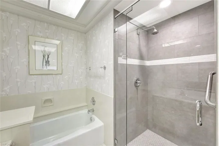 Bathroom with plus walk in shower