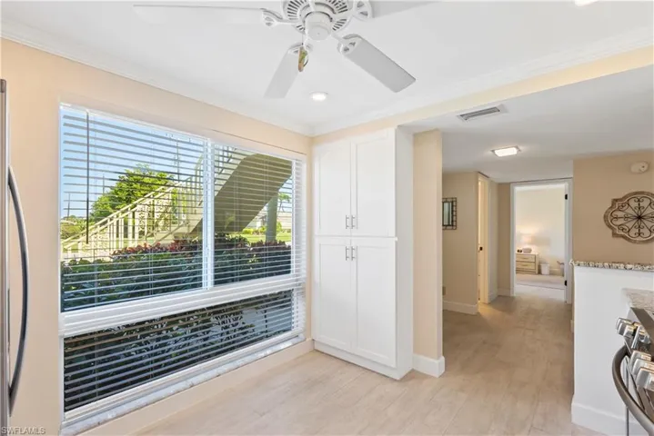 Area for a small table under the window.  Large pantry.