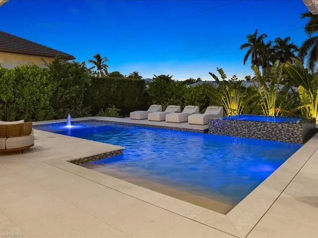 Outdoor pool with a patio