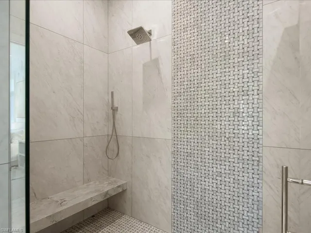 Bathroom featuring tiled shower