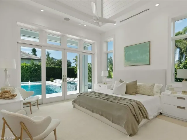 Bedroom with french doors, visible vents, access to exterior, and recessed lighting