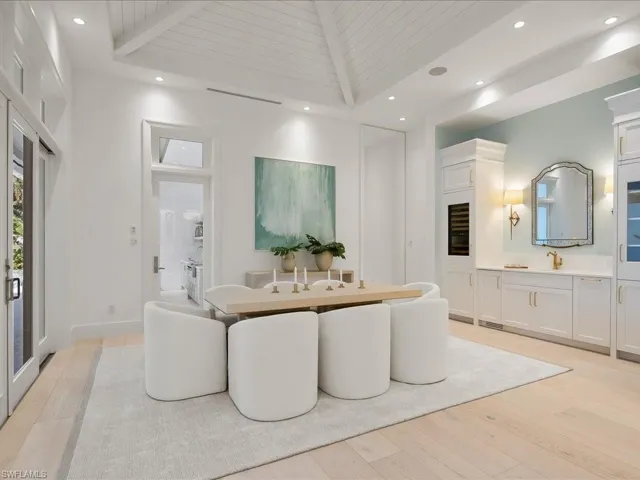 Living room featuring wooden ceiling, light wood finished floors, and recessed lighting