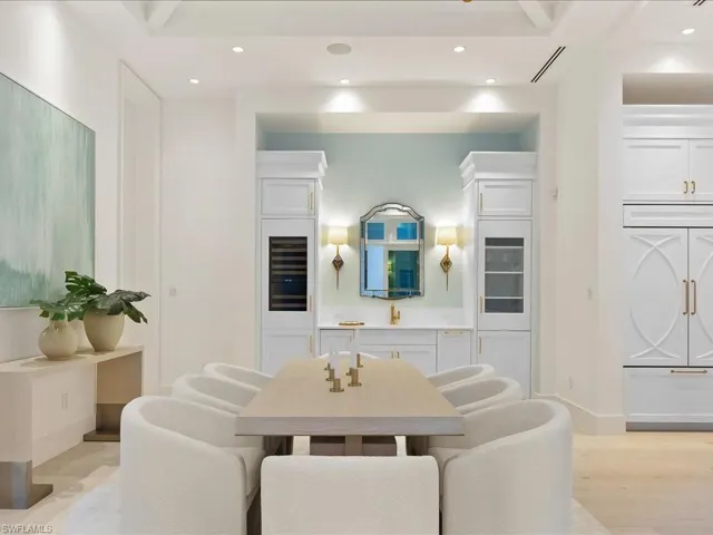 Dining room featuring baseboards, visible vents, light wood-style floors, and recessed lighting