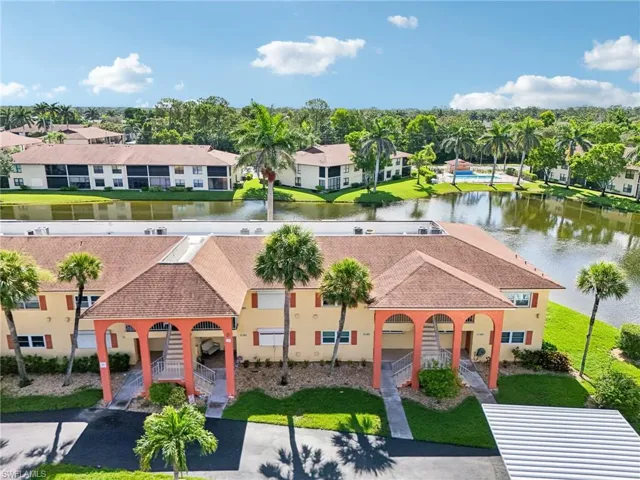 Aerial view of residential area with a large body of water