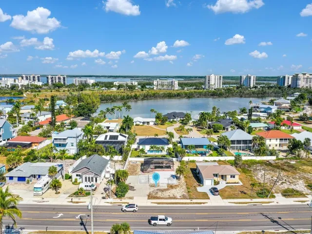 View of urban area with a large body of water and nearby suburban area