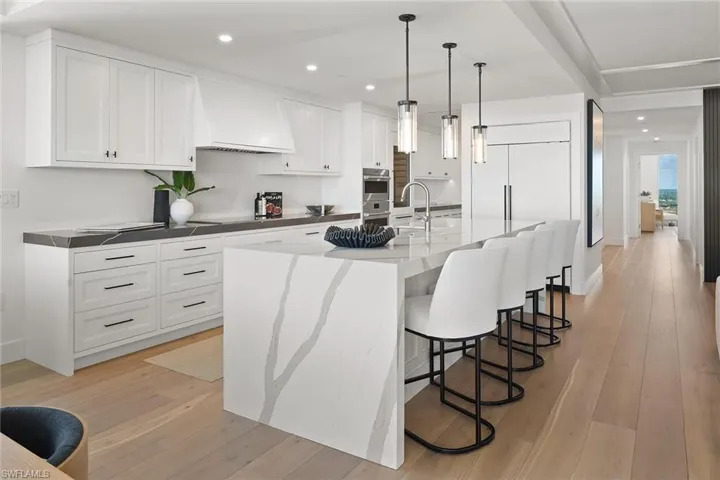 Chefs’ kitchen complemented by a well-appointed butler’s pantry adding storage and prep space