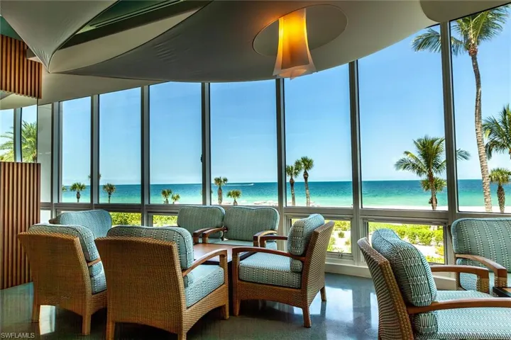 The Beach Club offers an air conditioned and open air restaurant and bar with stunning Gulf views