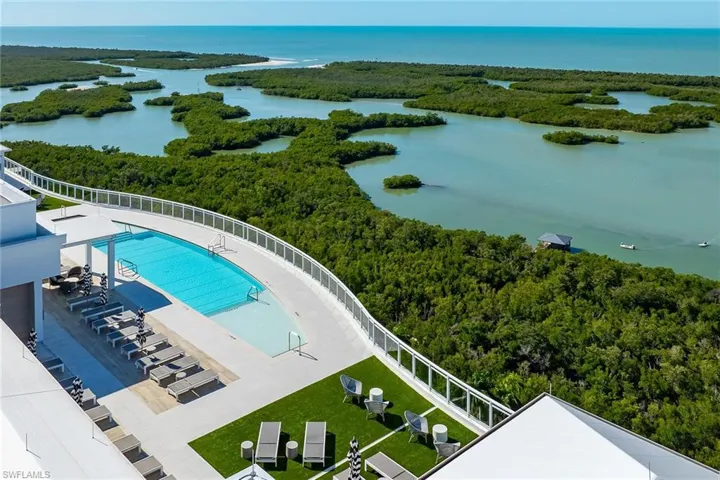 Resort-style Tower 300 rooftop pool, sundeck, barbecue areas, social spaces, restrooms, open air fitness and showers