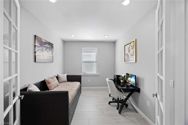 Home office with recessed lighting and french doors