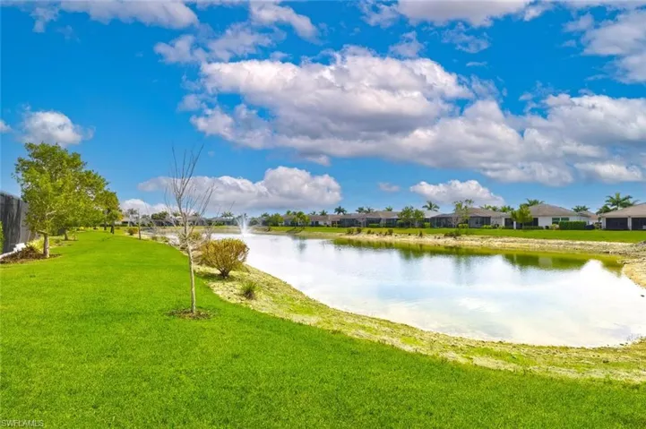 Water view featuring nearby suburban area