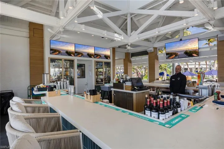 View of patio featuring a bar