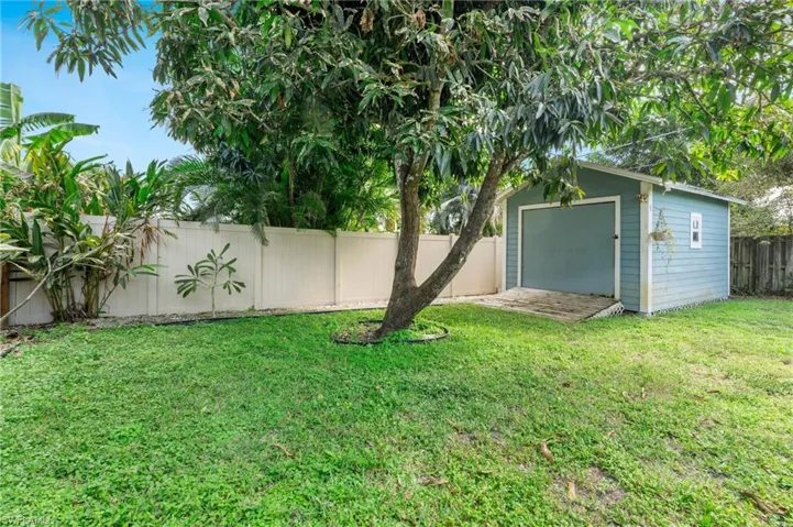 View of yard featuring a storage shed
