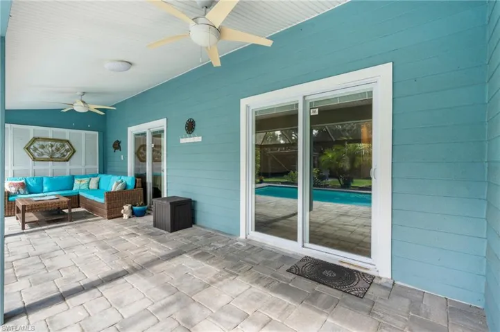 View of patio / terrace with ceiling fan and an outdoor living space