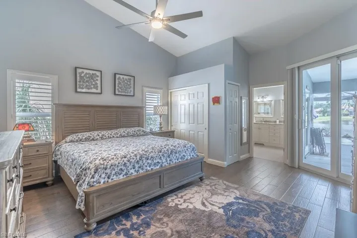 Large primary bedroom with high ceilings, access to lanai.