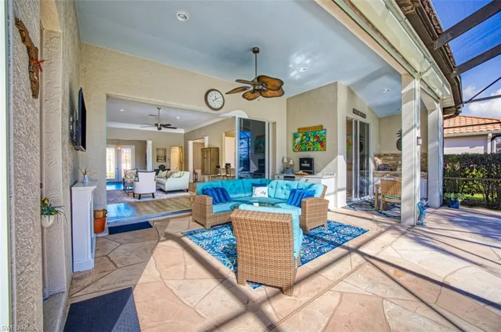 View of patio / terrace with ceiling fan and an outdoor hangout area