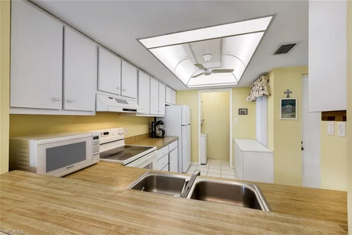View of the kitchen from the dining room. Landry room and pantry are just off the kitchen.