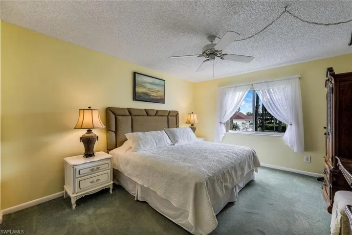Relax in your primary bedroom suite after a day at the pool or at the beach!