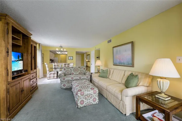 View of dining room and kitchen from living room.