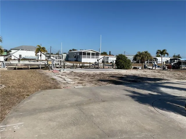 View of yard with a dock