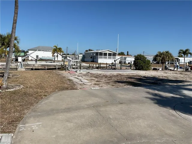 View of yard with a boat dock