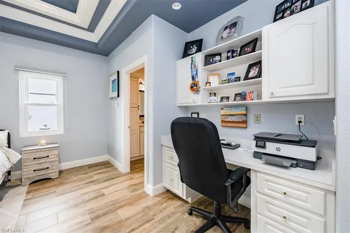Owner's bathroom featuring a double sink vanity, a massive walk in shower, walk in closet, storage closet, and private water closet.