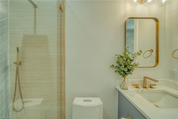 Full bath featuring vanity and a walk in shower
