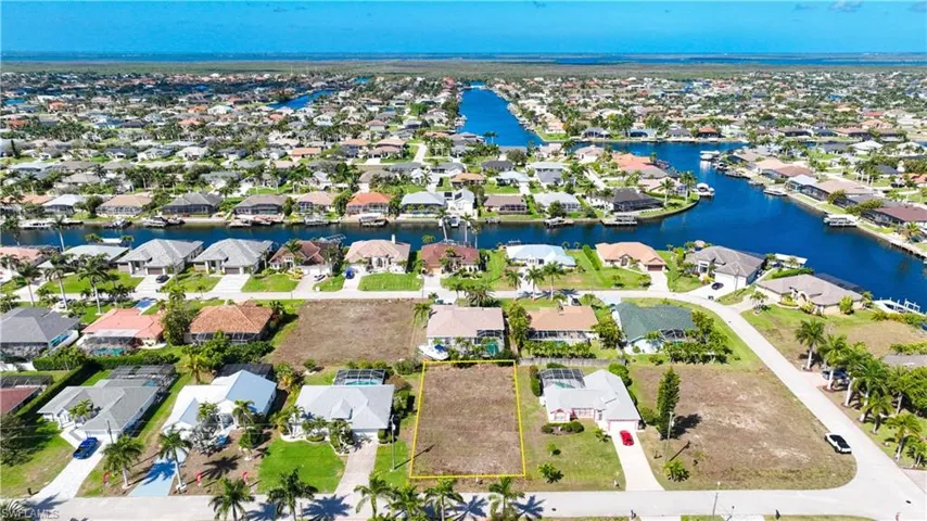 Aerial view of residential area with a nearby body of water