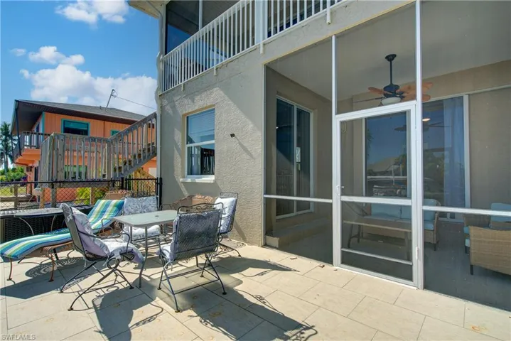 Patio / terrace with a patio, outdoor dining space, and a ceiling fan