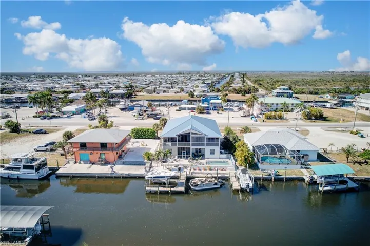 Aerial view of residential area with a large body of water