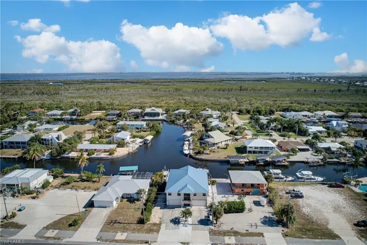 Aerial view of residential area with a nearby body of water