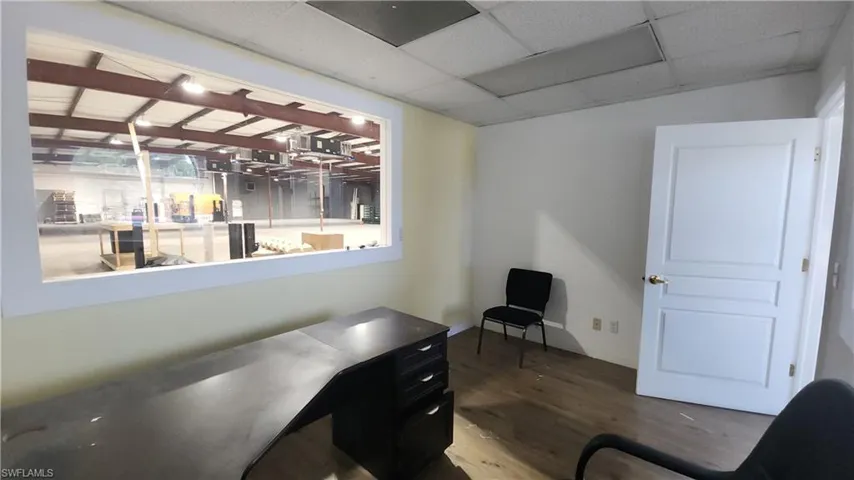 Office space with wood finished floors