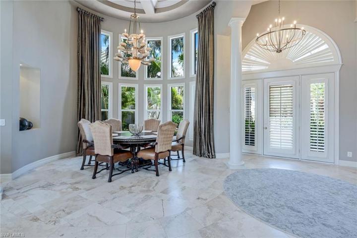 Foyer/entryway and formal dining room. This home is so very light and bright!